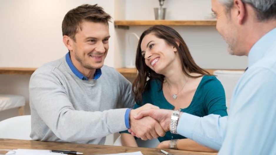 Happy Couple with Contract Builder
